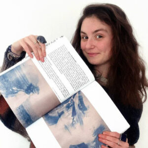 Featured artist with art magazine